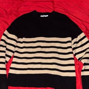 Elegant Black and Cream Striped Crewneck Sweater